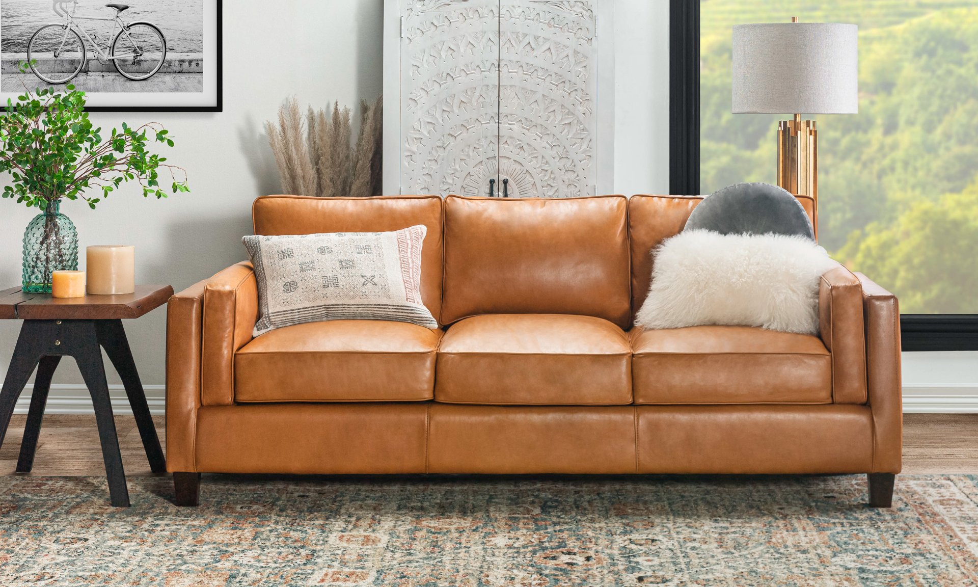 Brown leather sofa  in a living room.